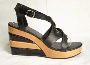 black and nature soles heels wooden clogs assembled together