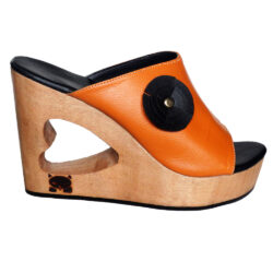 heel sole shoe with heart design sculpture