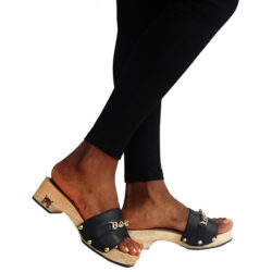 woman wearing low heel shoes made of wooden heel fair trade ecofriendly